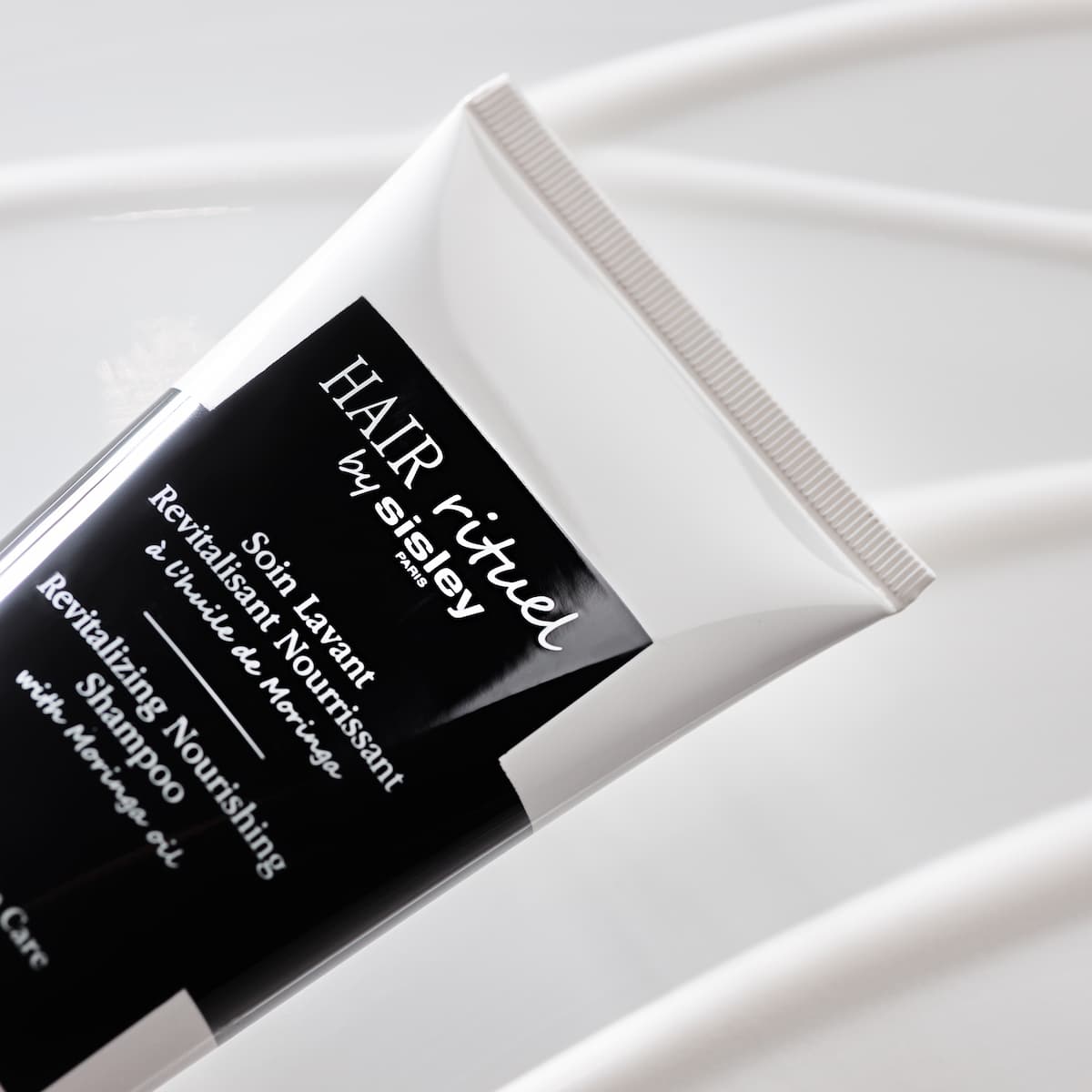 Hair Rituel by Sisley Шампунь тонизирующий питательный купить в VISAGEHALL