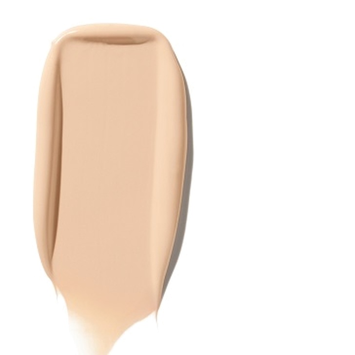Тональный крем с эффектом увлажнения Moisture Surge Tinted