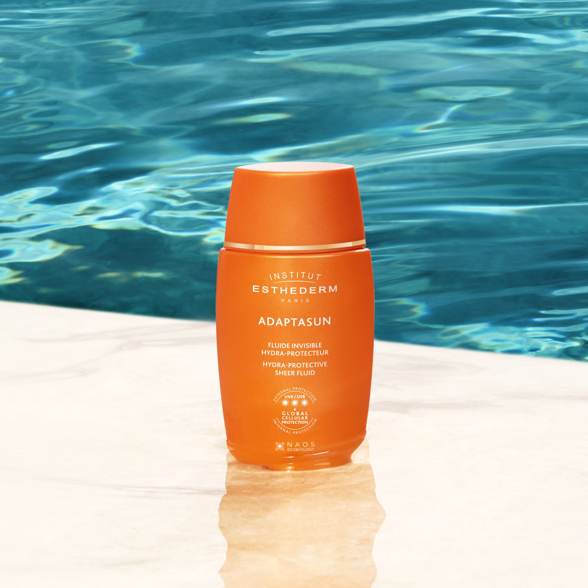 Солнцезащитный флюид Adaptasun купить в VISAGEHALL